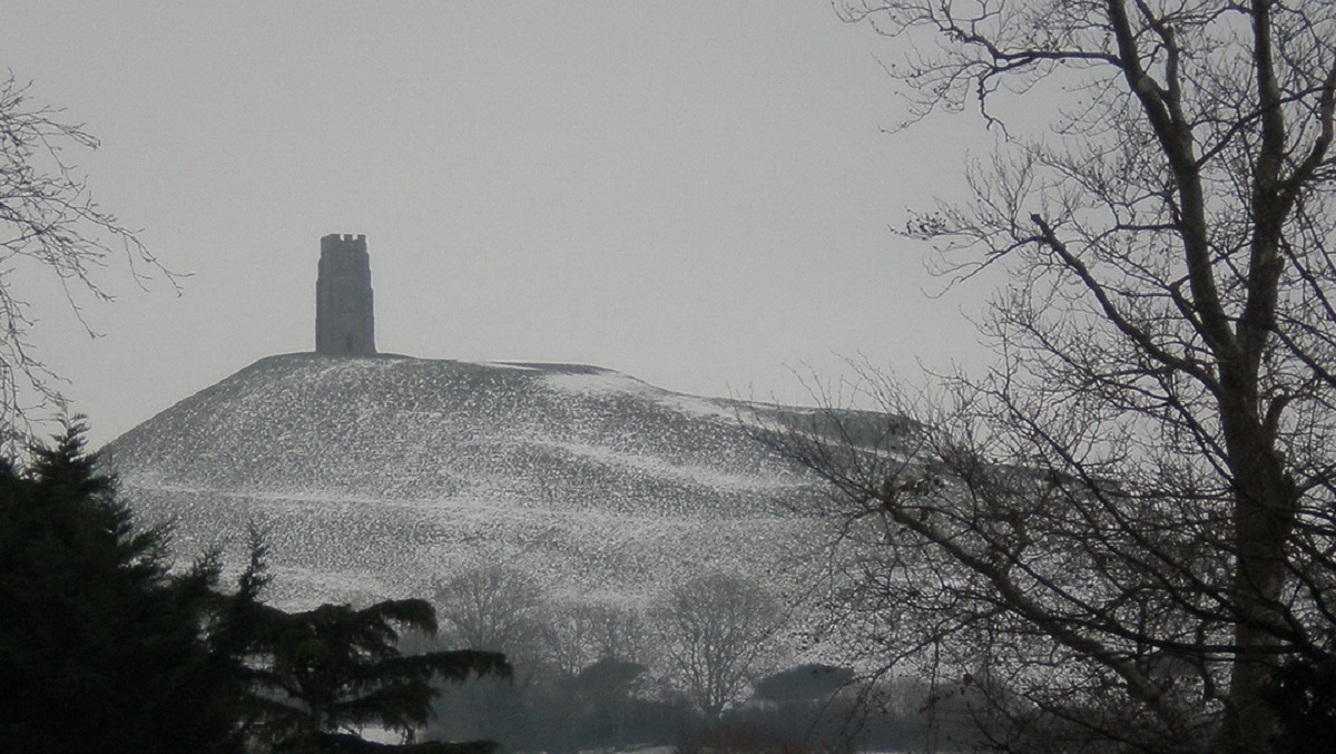 Snow-Covered Glastonbury Tor Inspires Spiritual Joy